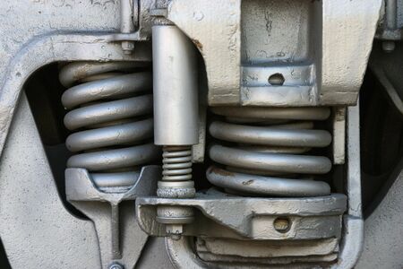 Large springs are part of a train suspension.の写真素材