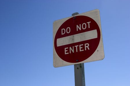 A "Do Not Enter" sign as seen from an athoritative low angle.の写真素材