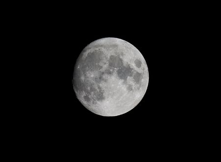A nearly full moon as seen through an 800mm lens.