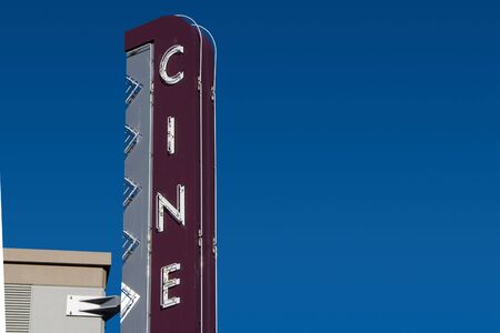 A retro Cine sign, outside of a movie theater.の写真素材