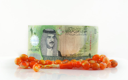 Bahrain currency with Rosary - isolated の写真素材