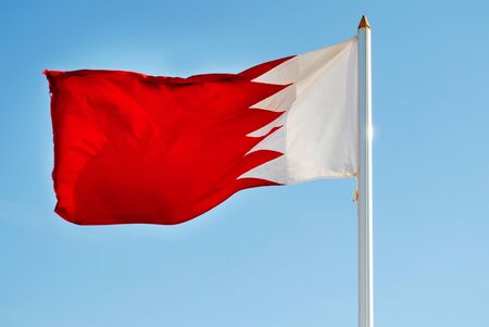 Bahrain flag waving isolated  blue sky