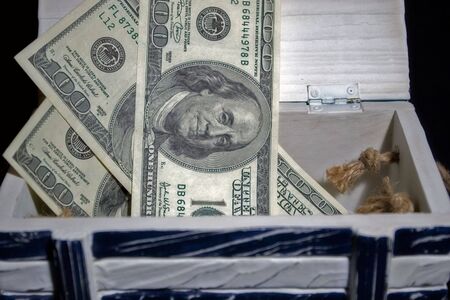 photo of the dollars in the boxの写真素材