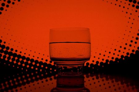 a glass of drink in the night clubの写真素材