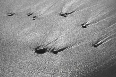 sand stones on sea waves movie blurの写真素材