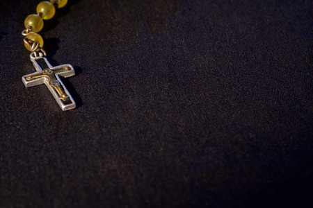 rosary on blackground with free space