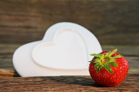 Ripe red strawberries on a wooden table. Healthy food photo. Strawberryの写真素材