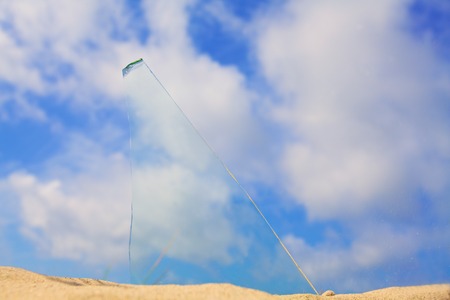 broken glass fragment on heavenly backgroundの写真素材