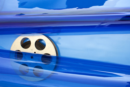 Movie film reel on blueの写真素材