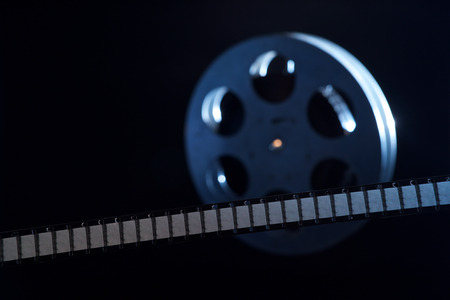 Movie film reel on darkの写真素材