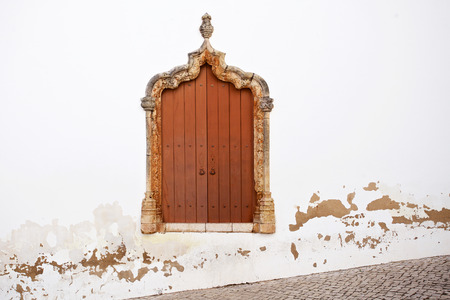 ancient window with space on wall for textの写真素材