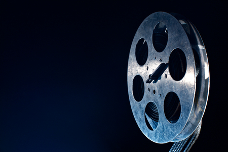 Movie film reel on darkの写真素材