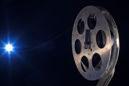 Movie film reel on darkの写真素材
