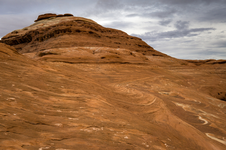 Atop a giant rock in the Needles District of Canyonlands National Park.の写真素材