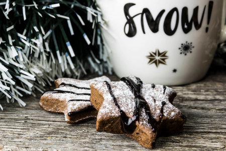Winter cup "Snow" on the background of a tree, a tree and a pine coneの写真素材