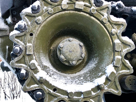 The wheel on the caterpillar of the tank