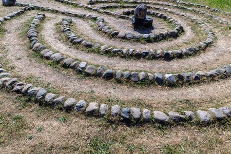 Labyrinth of stones in summerの写真素材