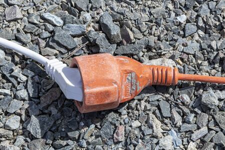 Excessive extension on power outlet, very dangerousの写真素材