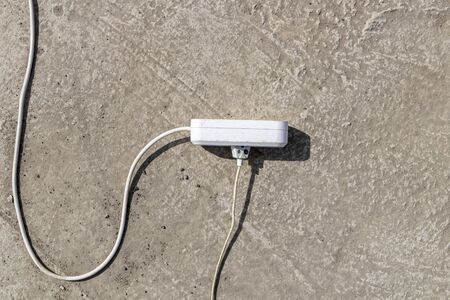 Excessive extension on power outlet, very dangerousの写真素材