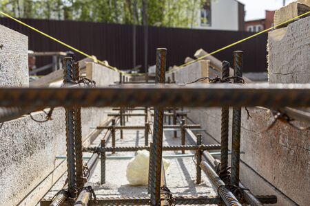 Foundation site of new house, building, details and reinforcements with steel bars and wire rod,...