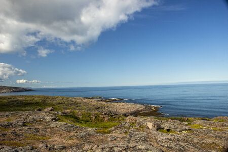 Beautiful aerial view on sea surface and rocky coastの写真素材