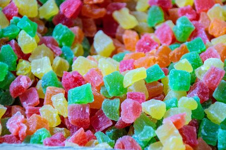 Background candied colorful fruit. Pineapple bits.の写真素材