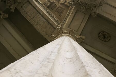 classic antique architecture marble columns enter to palace symmetry foreshortening from below.