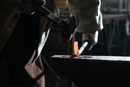 Blacksmith's workplace with horn fire hammer anvil metalの写真素材