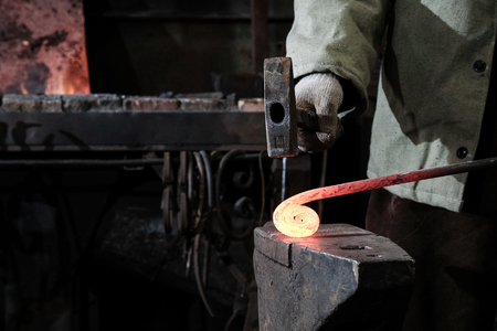 Blacksmith's workplace with horn fire hammer anvil metal
