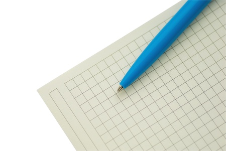 Blue pen lying on the white sheet into the cellの写真素材