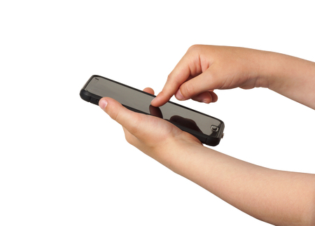 Smartphone in children's hands. Isolated on white.の写真素材