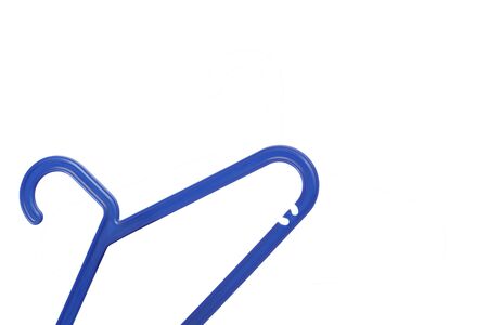 Blue plastic clothes hanger. Isolated on white.の写真素材