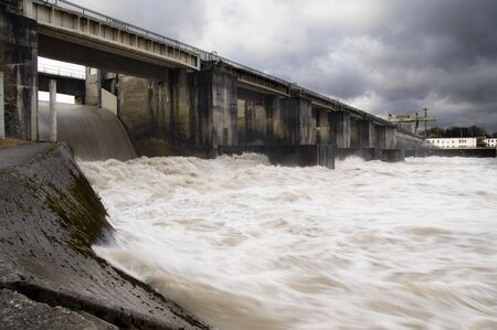 Dam at the river inn after heavy railfallの写真素材