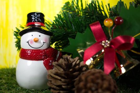 hristmas Decoration and Ornaments- Snow Man on Christmas Tree background with Selective Focus in Vintage Colorの写真素材