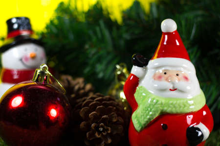 Christmas Decoration and Ornaments- Snow Man and Santa Claus with Selective Focusの写真素材