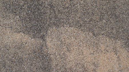 Close up Wall of small stones texture backgroundの写真素材