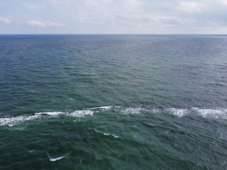Beautiful sandy beach and transparent waves of the Mediterranean Seaの写真素材