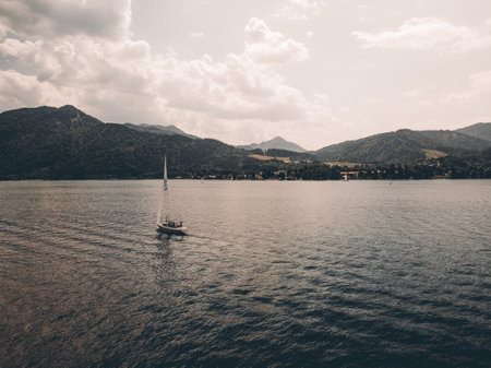 Sailboat sailing on crystal turquoise watersの写真素材