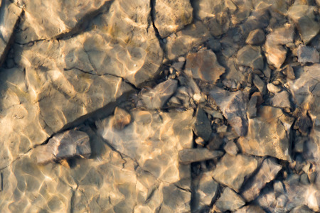 stones under the water
