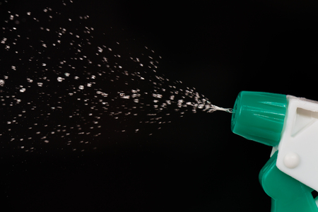 Water spray on black backgroundの写真素材