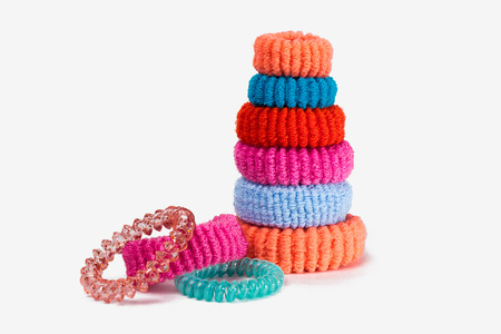 Tower of multi-colored rubber bands for hair
