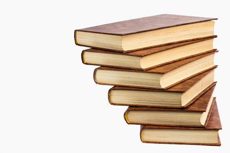 Old books shelf isolated on white backgroundの写真素材