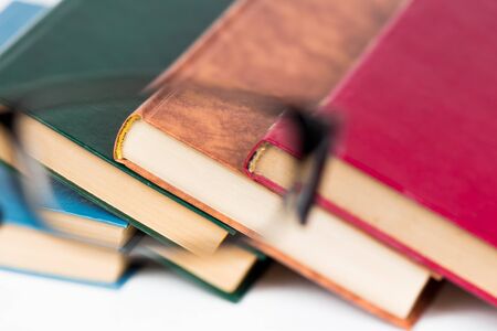 Spectacles on the book,in concept Sharpness with Spectacles