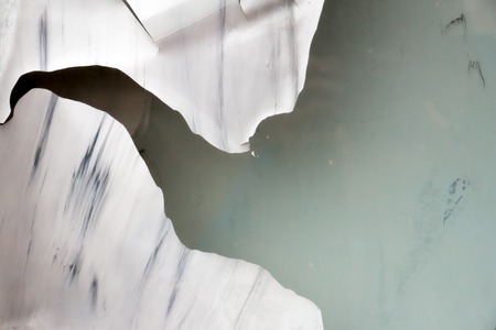 old white paint on a window glass textureの写真素材