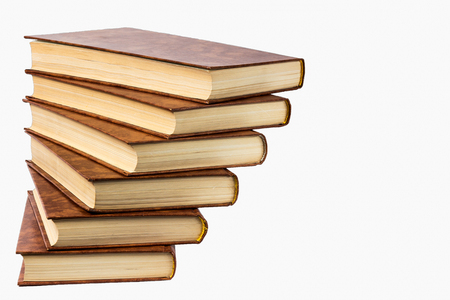 Old books shelf isolated on white backgroundの写真素材