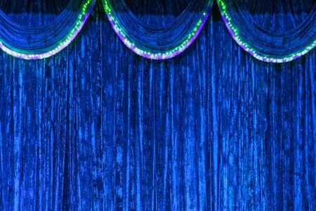 Blue curtain on stage as backgroundの写真素材