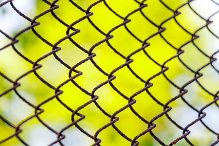 Mesh netting in perspective on a green background as a backgroundの写真素材