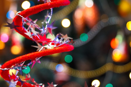 christmas background, image blur bokeh defocused lights decoration on christmas treeの写真素材