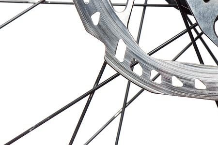 Bicycle brake disk close up on a white backgroundの写真素材