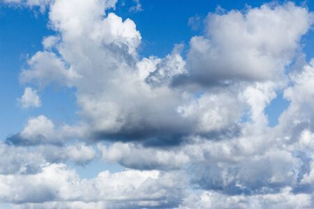 Cumulus Clouds in the blue sky before the stormの写真素材